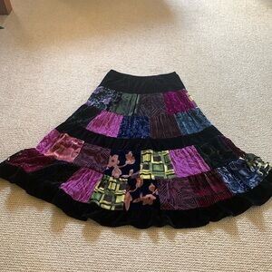 Cute! Mid length. All velvet. Fully lined. Worn once.